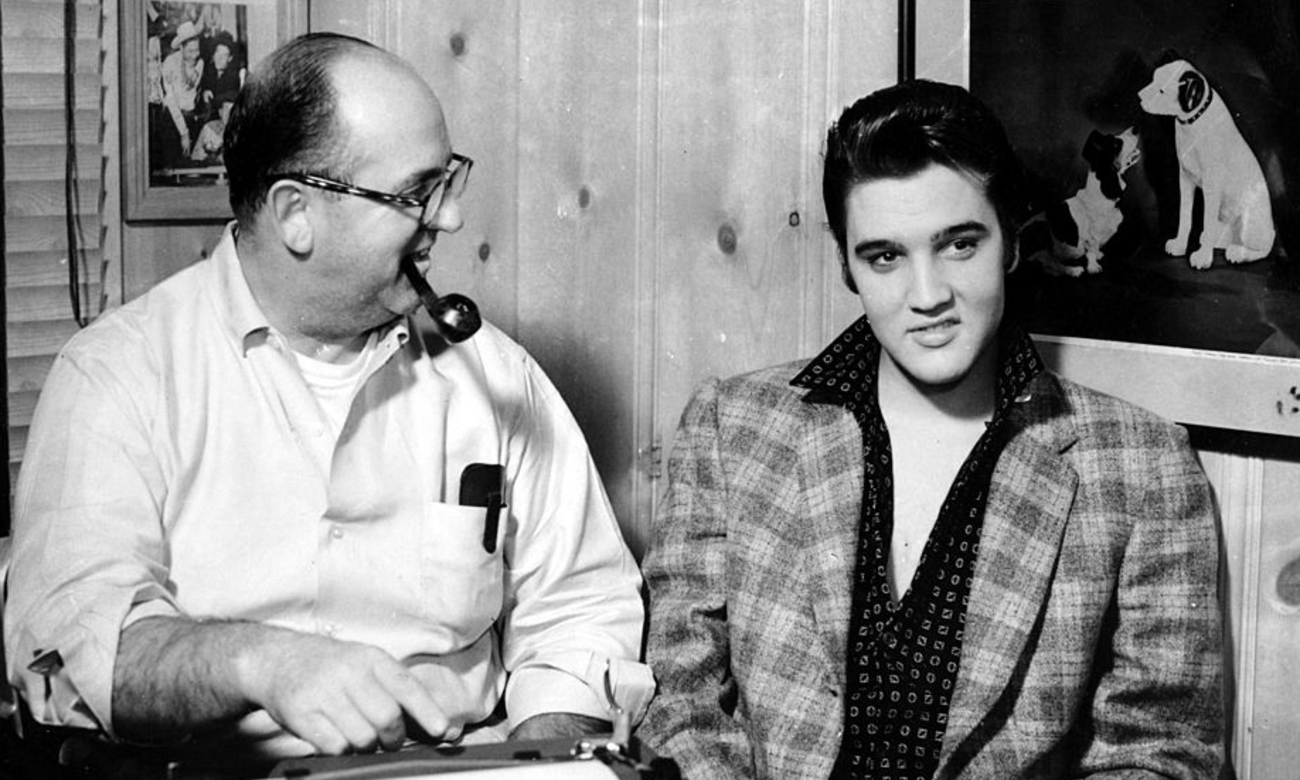 經紀人科洛內爾‧湯姆‧帕克（Colonel Tom Parker）與貓王（Elvis Presley）。